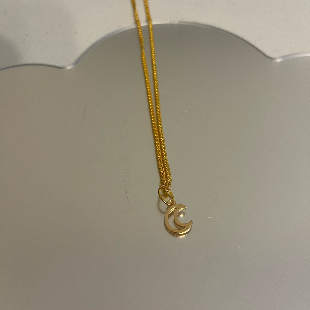 Gold moon necklace